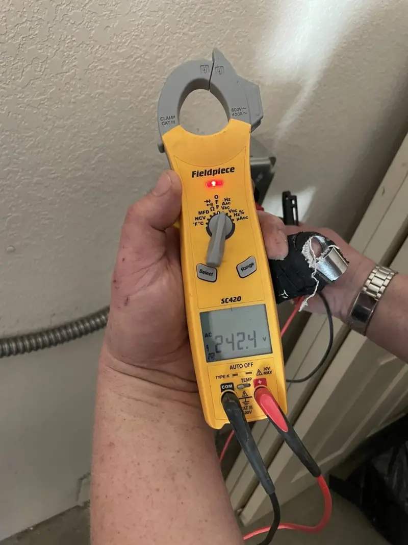 Voltage testing with clamp meter during Aluminum Wiring Replacement in Rawlins